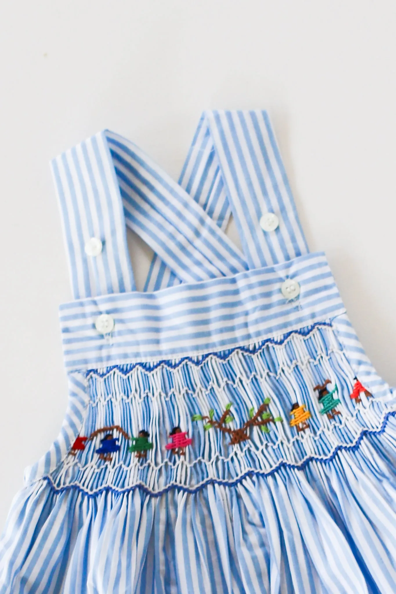 Hand-Smocked Romper Children Playing   Blue and White Stripe